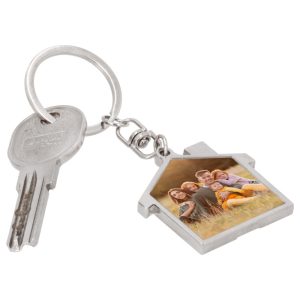 "Llavero en forma de casita sublimable ideal para personalización a doble cara"